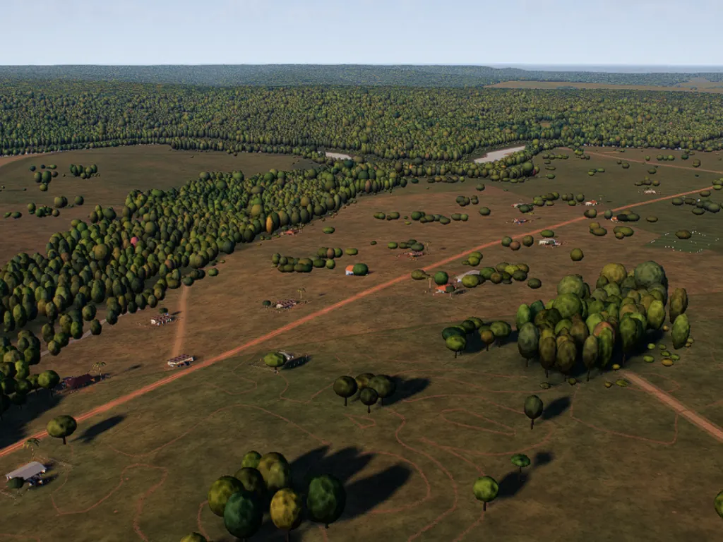 Ranch land from the air: red dirt roads, scattered trees, a strip of gallery forest and a few farm buildings.
